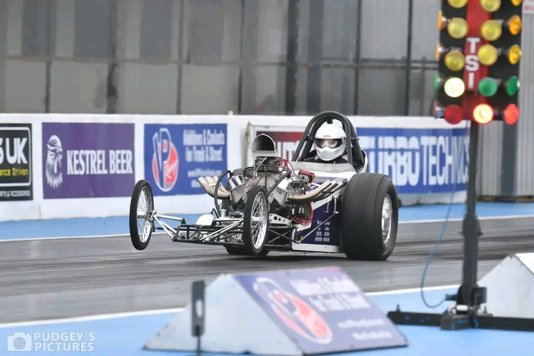 Wayne Colliver driving a Nostalgia Nationals car