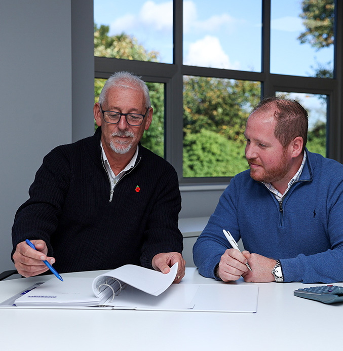 Kevin Wornock and John Clare in a meeting