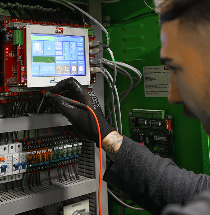 Engineer working on green controller