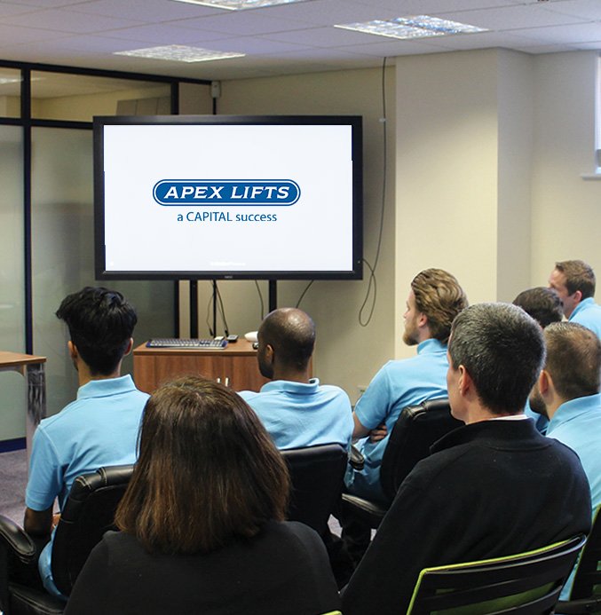 training-academy-group-apprentice Group of people watching an Apex Lifts Vertical Transport Masterclass
